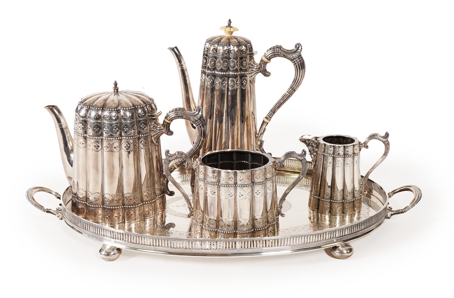 A late Victorian five piece silver tea and coffee service, all pieces with makers marks for John Edward Bingham and Walker & Hall